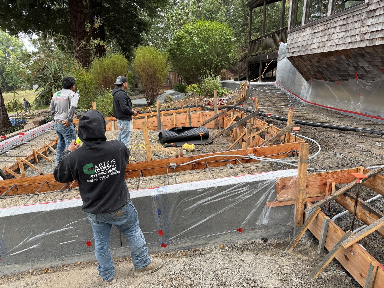 San Carlos Concrete crew building foundation forms